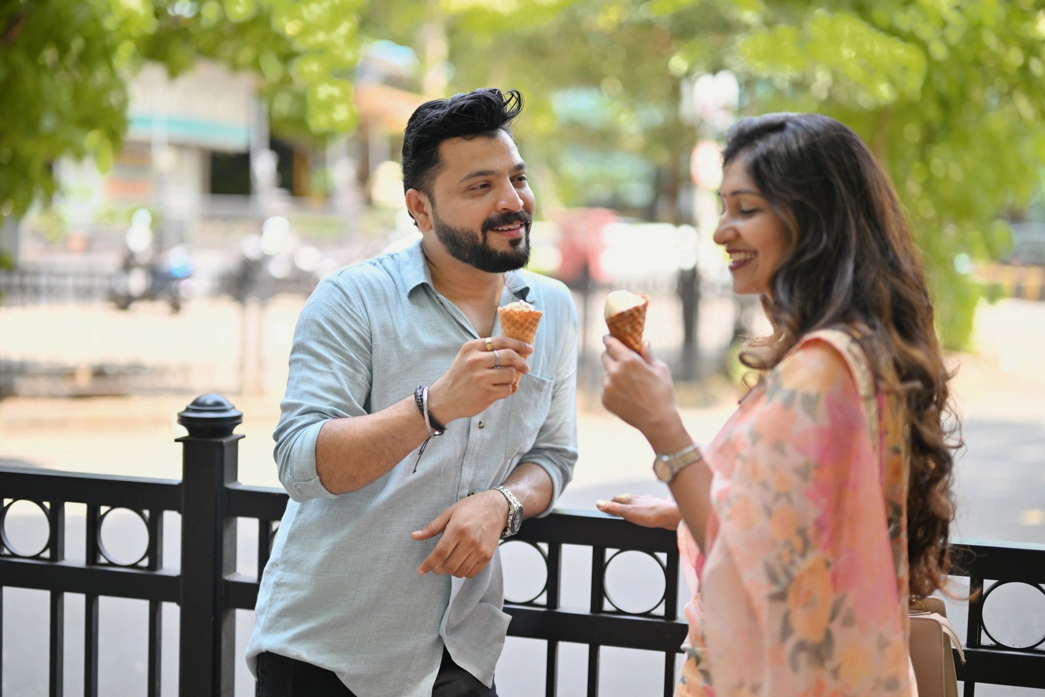 Couple sharing an ice cream cone