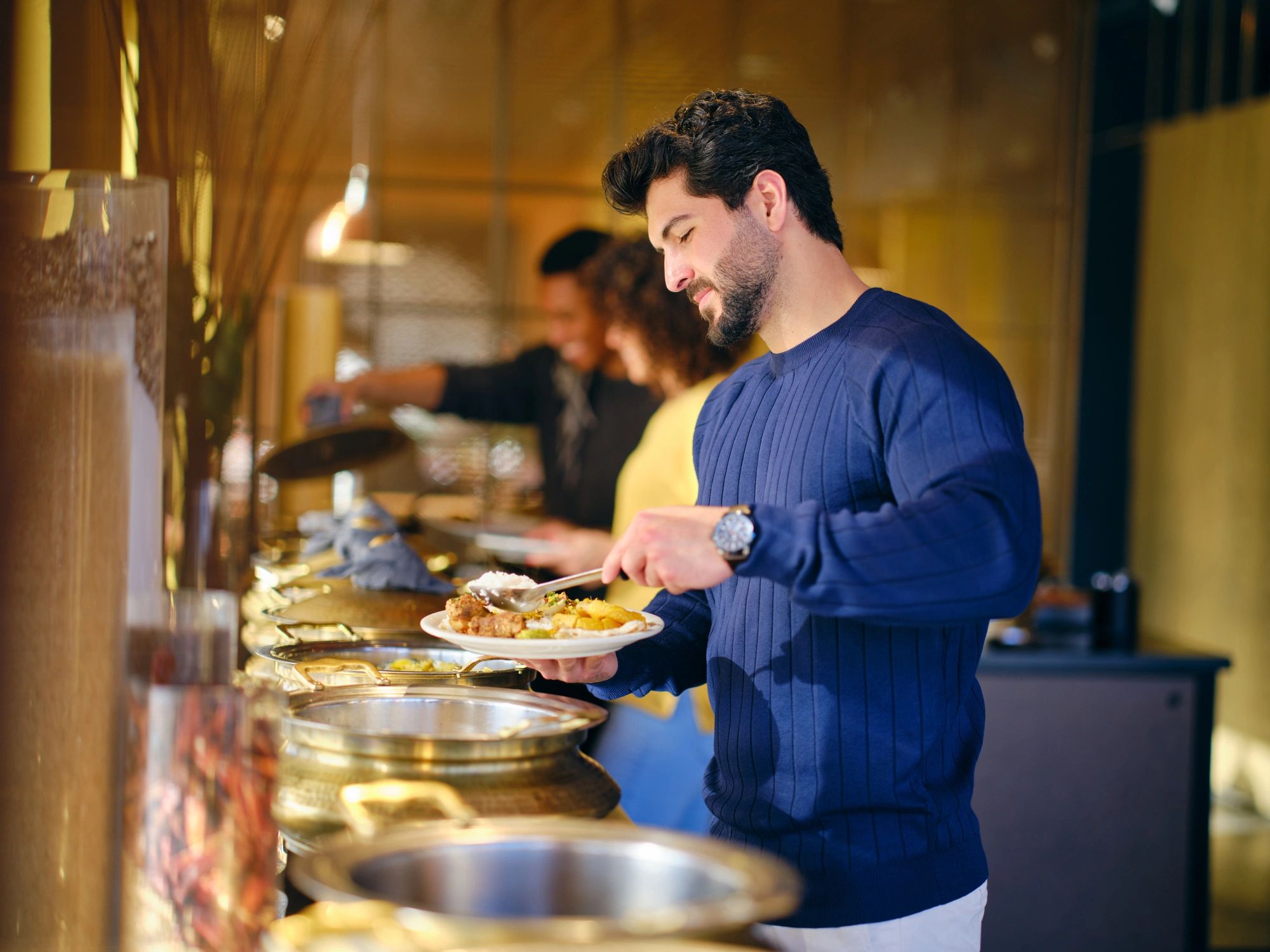 Group enjoying food together at a social event