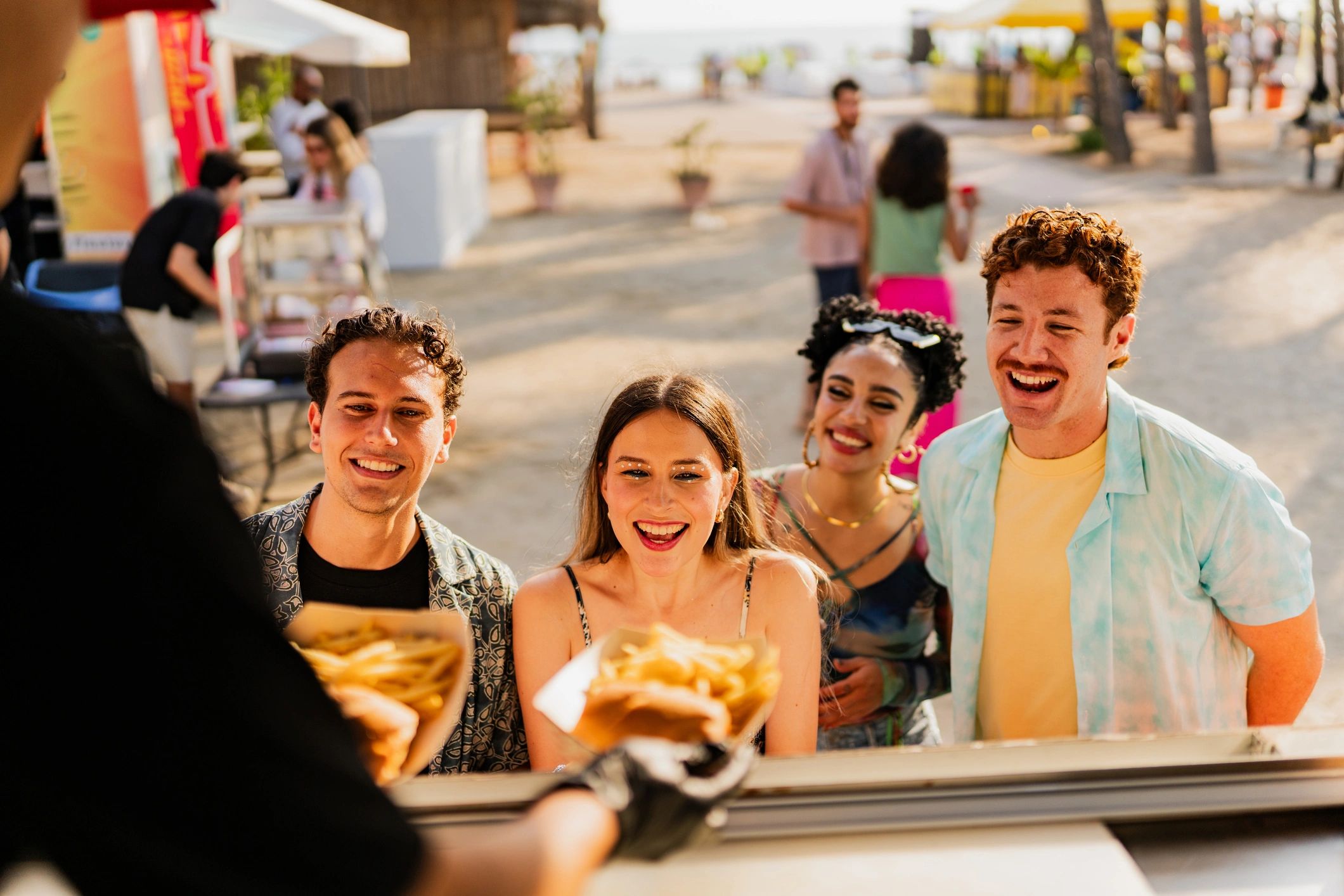Friends buying snacks at an outdoor food truck
