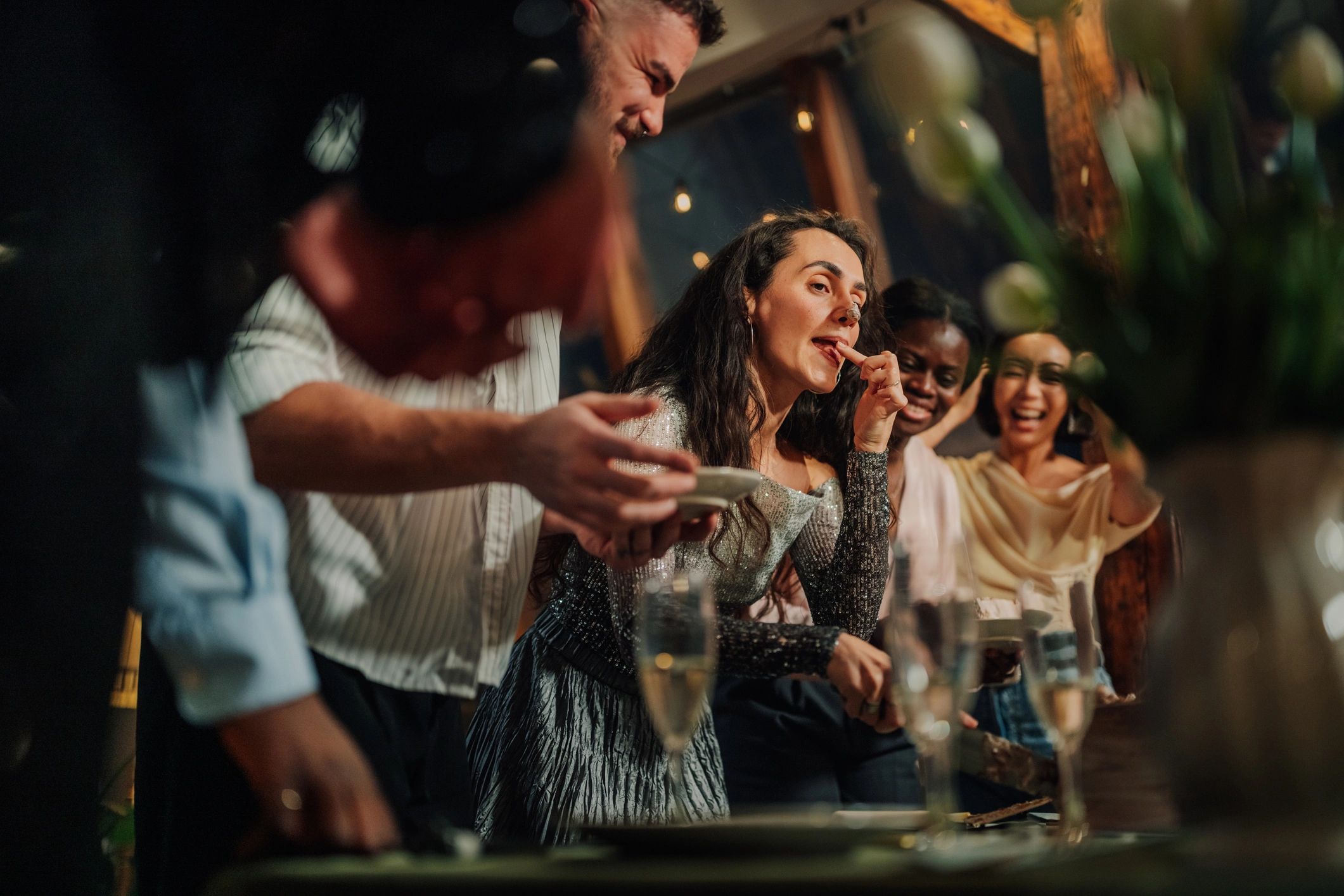 Guest enjoying dessert at an evening event