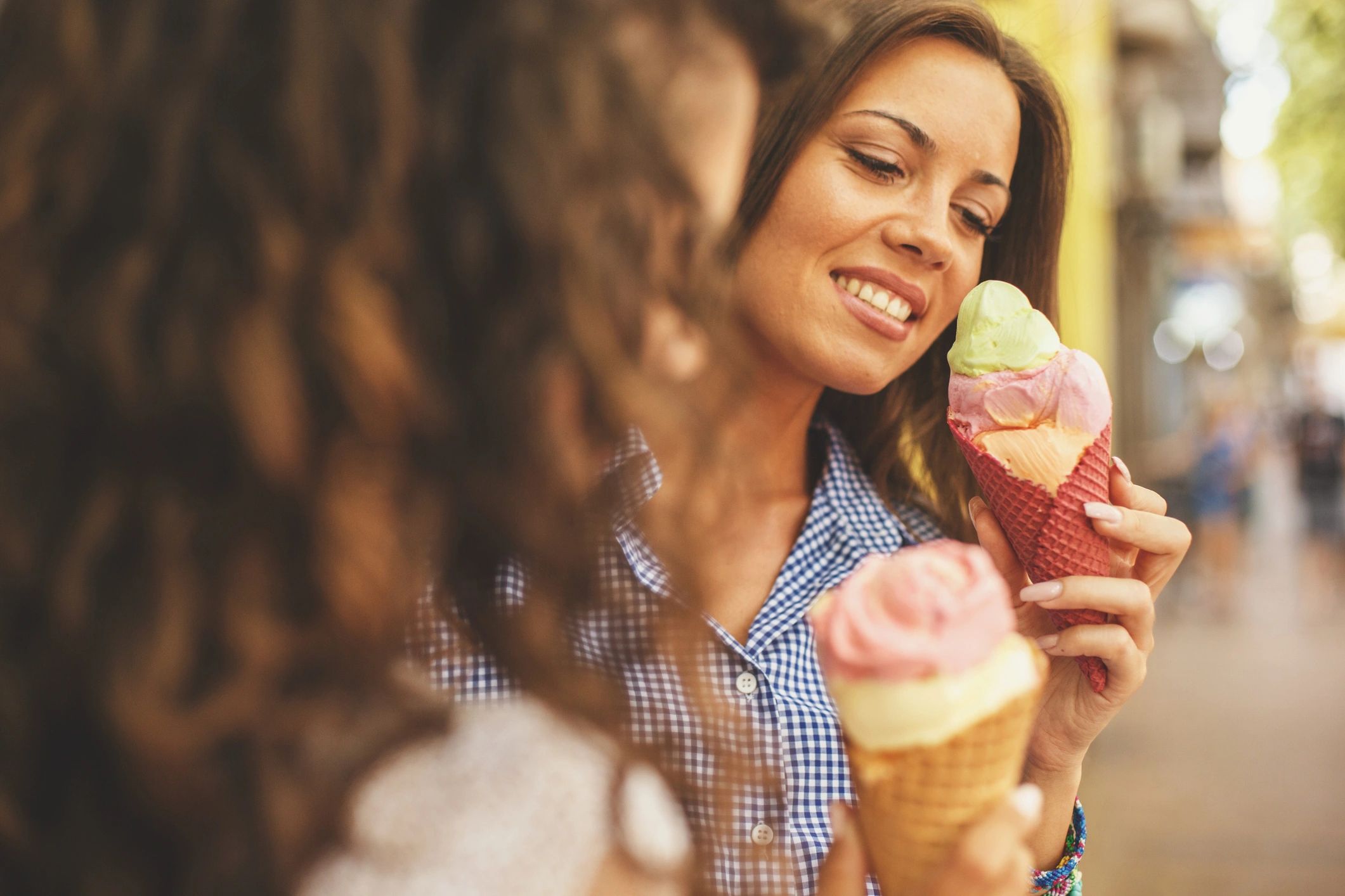 Friends enjoying ice cream outdoors